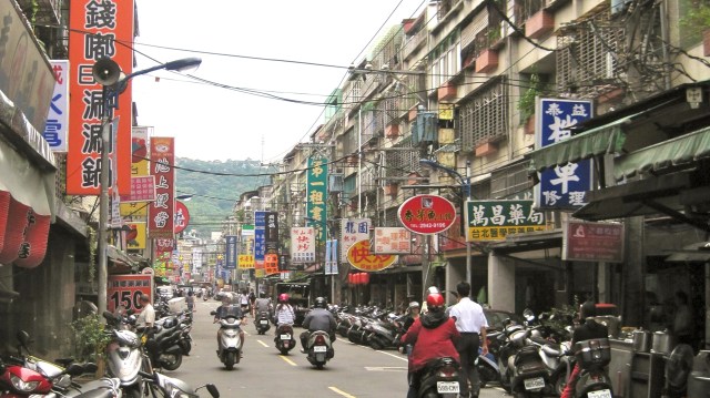Scooter-packed street in Nanshijiao, Taipei 