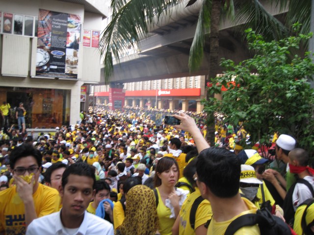 A cloud of tear gas wafts into the crowd in front of Masjid Jamek just after 3 pm, Saturday, April 28