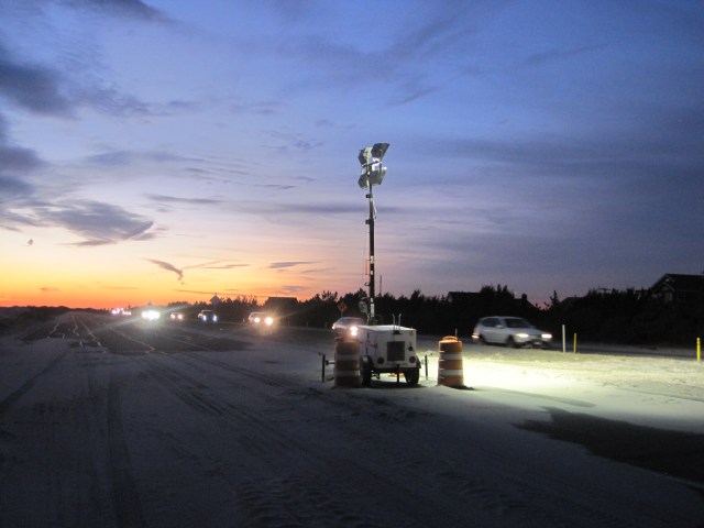 Half of the highway outside of Jones Beach remains covered in sand in sections, Long Island